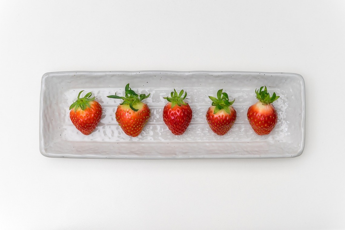 Strawberries displayed on a plate